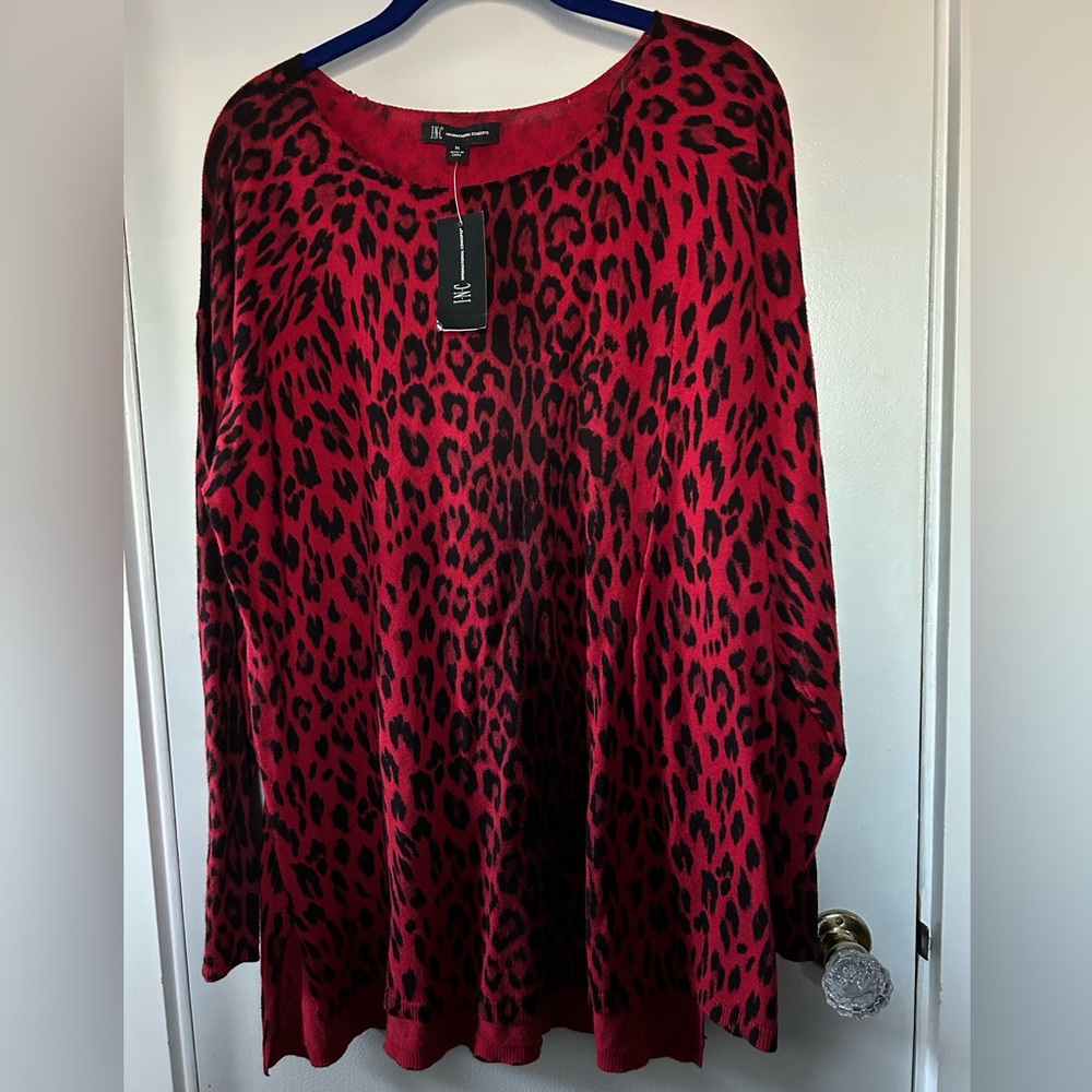 Red and black animal print long sleeve sweater.